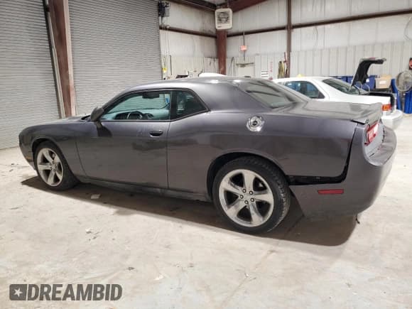 ✅ 2014 Dodge Challenger SXT • VIN: 2C3CDYAG9EH133472 • Lot: 44821425. Wystawiony na Copart z przebiegiem 132 298 mil. Bezpłatny archiwum sprzedaży aukcyjnych z USA i szczegółowy raport historii pojazdu na DreamBid. Zdjęcie 2.