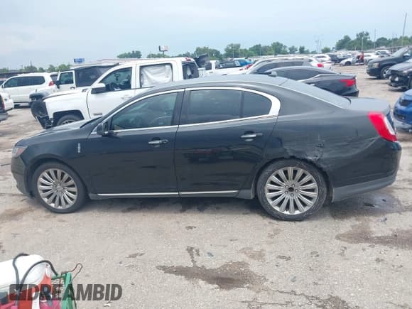✅ 2014 Lincoln MKS • VIN: 1LNHL9DK9EG602092 • Lot: 43049470. Wystawiony na IAAI z przebiegiem 302 939 mil. Bezpłatny archiwum sprzedaży aukcyjnych z USA i szczegółowy raport historii pojazdu na DreamBid. Zdjęcie 14.
