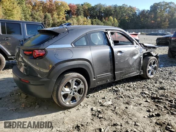 ✅ 2023 Mazda MX-30 Premium Plus • VIN: JM1DRADBXP0200211 • Lot: 77109834. Wystawiony na Copart z przebiegiem 10 778 mil. Bezpłatny archiwum sprzedaży aukcyjnych z USA i szczegółowy raport historii pojazdu na DreamBid. Zdjęcie 3.