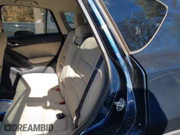 ✅ 2014 Mazda CX-5 Touring • VIN: JM3KE4CY3E0426377 • Lot: 43712899. Wystawiony na IAAI z przebiegiem 96 957 mil. Bezpłatny archiwum sprzedaży aukcyjnych z USA i szczegółowy raport historii pojazdu na DreamBid. Zdjęcie 8.