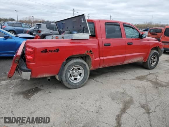 2007 Dodge Dakota ST z VIN 1D7HW28N07S163927, wystawiony jako Copart lot #46596084 z przebiegiem 173 970 mil mil oraz Nie do naprawy • Non repairable. Historia ofert i sprzedaży dostępna na DreamBid. Obrazek 3.