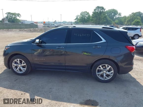 ✅ 2019 Chevrolet Equinox Premier • VIN: 2GNAXNEV4K6184569 • Lot: 42670537. Listed on IAAI with 163,594 mi. Free auction sales archive from the USA and detailed vehicle history report at DreamBid. Image 14.