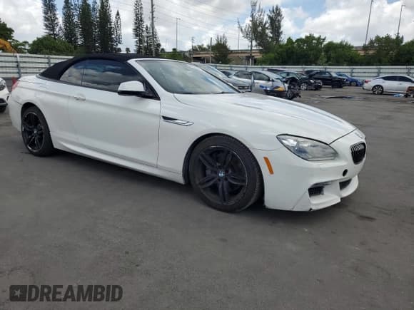 ✅ 2013 BMW 6 Series 650i • VIN: WBAYP9C53DDW21402 • Lot: 61458055. Listed on Copart with 90,694 mi. Free auction sales archive from the USA and detailed vehicle history report at DreamBid. Image 4.