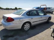 ✅ 2001 Ford Taurus LX • VIN: 1FAFP52U91G110062 • Lot: 67393004. Listed on Copart with 107,588 mi. Free auction sales archive from the USA and detailed vehicle history report at DreamBid. Image 3.
