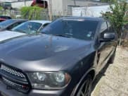 ✅ 2013 Dodge Durango R/T • VIN: 1C4SDHCT0DC689270 • Lot: 70104715. Listed on Copart with 169,510 mi. Free auction sales archive from the USA and detailed vehicle history report at DreamBid. Image 2.