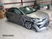 ✅ 2023 Kia Rio S • VIN: 3KPA24AD5PE601803 • Лот: 43203343. Опубликован ранее на IAAI с пробегом 10 916 миль. Бесплатный доступ к архиву аукционных продаж из США и подробный отчёт об истории автомобиля на DreamBid. Изображение 1.