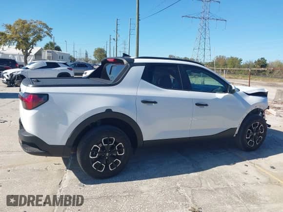 ✅ 2022 Hyundai Santa Cruz SEL • VIN: 5NTJC4AE2NH032425 • Лот: 41734794. Размещён на IAAI с пробегом 12 808 миль миль. Получите бесплатный доступ к архиву аукционных продаж из США и посмотрите подробный отчёт об истории автомобиля на DreamBid. Изображение 13.