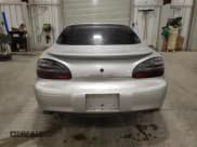 ✅ 2001 Pontiac Grand Prix GT • VIN: 1G2WP12K41F236700 • Lot: 90725125. Listed on Copart with 1,786,650 mi. Free auction sales archive from the USA and detailed vehicle history report at DreamBid. Image 6.