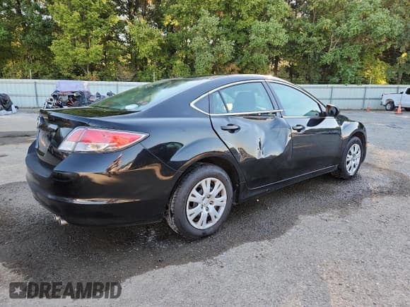 ✅ 2009 Mazda 6 i Sport • VIN: 1YVHP81H995M44909 • Лот: 86241865. Опубликован ранее на Copart с пробегом 154 526 миль. Бесплатный доступ к архиву аукционных продаж из США и подробный отчёт об истории автомобиля на DreamBid. Изображение 3.