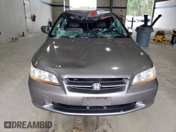 2000 Honda Accord EX с VIN 1HGCG6673YA139658, выставлен на аукционе Copart как лот 73036004 с пробегом 281 401 миль миль и Списание • Salvage title. История ставок и продаж доступна на DreamBid. Изображение 5.
