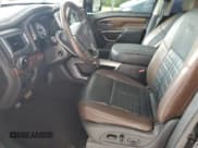 ✅ 2016 Nissan Titan Platinum Reserve • VIN: 1N6BA1F25GN507765 • Лот: 72049925. Опубликован ранее на Copart с пробегом 104 347 миль. Бесплатный доступ к архиву аукционных продаж из США и подробный отчёт об истории автомобиля на DreamBid. Изображение 7.