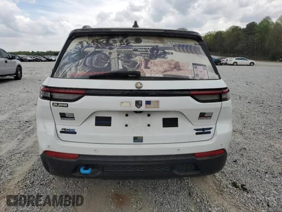 2022 Jeep Grand Cherokee Trailhawk with VIN 1C4RJYC65N8720955, listed as a Copart auction lot 51505265 with 27,618 mi miles and Salvage title. Bid and sale history available at DreamBid. Image 6.