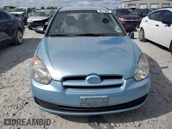 2007 Hyundai Accent GS z VIN KMHCM36C97U046607, wystawiony jako Copart lot #76411064 z przebiegiem 106 410 mil mil oraz Czysty tytuł • Clean title. Historia ofert i sprzedaży dostępna na DreamBid. Obrazek 6.