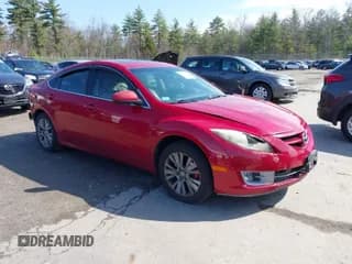 ✅ 2009 Mazda 6 i Grand Touring • VIN: 1YVHP82A495M04111 • Lot: 42031522. Listed on IAAI with 251,839 mi. Free auction sales archive from the USA and detailed vehicle history report at DreamBid. Image 1.