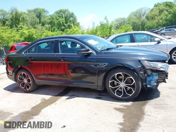 ✅ 2013 Ford Taurus SHO • VIN: 1FAHP2KT4DG118525 • Lot: 42234961. Wystawiony na IAAI z przebiegiem 161 208 mil. Bezpłatny archiwum sprzedaży aukcyjnych z USA i szczegółowy raport historii pojazdu na DreamBid. Zdjęcie 14.