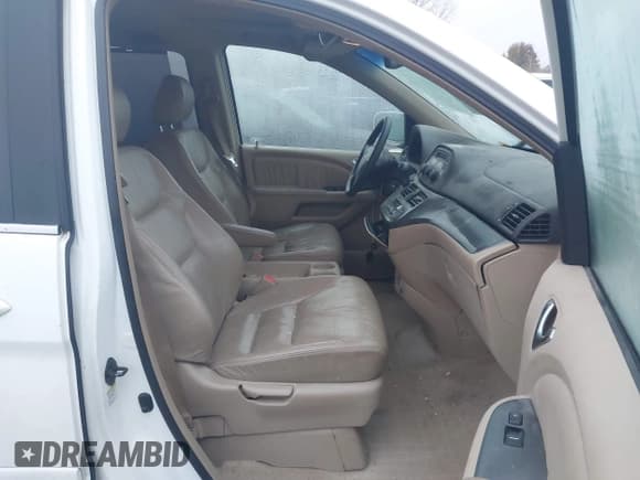 ✅ 2005 Honda Odyssey EX-L • VIN: 5FNRL38655B411556 • Lot: 43704042. Listed on IAAI with 205,713 mi. Free auction sales archive from the USA and detailed vehicle history report at DreamBid. Image 5.