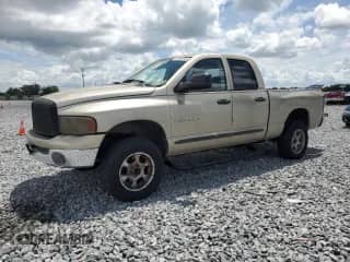 2002 Dodge 1500 with VIN 3D7HA18Z82G114230, listed as a Copart auction lot 68140185 with 211,777 mi miles and Salvage title. Bid and sale history available at DreamBid. Image 1.