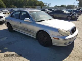 ✅ 2003 Hyundai Sonata • VIN: KMHWF25SX3A818800 • Lot: 82638495. Listed on Copart with 127,008 mi. Free auction sales archive from the USA and detailed vehicle history report at DreamBid. Image 4.