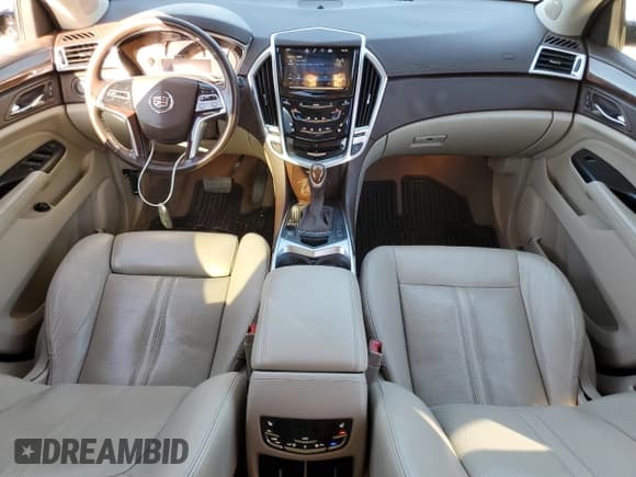 ✅ 2015 Cadillac SRX Premium Collection • VIN: 3GYFNDE32FS566887 • Лот: 85687105. Опубликован ранее на Copart с пробегом 85 806 миль. Бесплатный доступ к архиву аукционных продаж из США и подробный отчёт об истории автомобиля на DreamBid. Изображение 8.