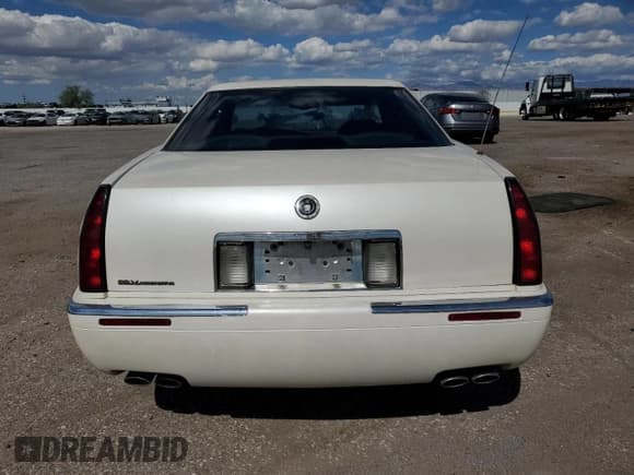 ✅ 1999 Cadillac Eldorado • VIN: 1G6EL12Y1XU610808 • Lot: 87164615. Wystawiony na Copart z przebiegiem 133 766 mil. Bezpłatny archiwum sprzedaży aukcyjnych z USA i szczegółowy raport historii pojazdu na DreamBid. Zdjęcie 6.