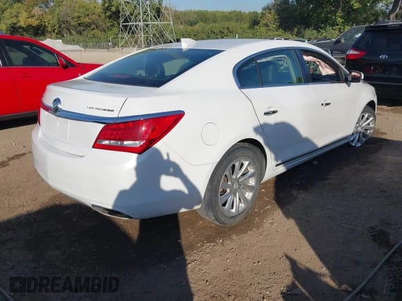 ✅ 2015 Buick LaCrosse Leather • VIN: 1G4GB5G36FF228396 • Lot: 43339608. Listed on IAAI with 85,075 mi. Free auction sales archive from the USA and detailed vehicle history report at DreamBid. Image 4.