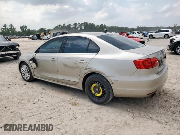 ✅ 2014 Volkswagen Jetta TDI w/Premium/Nav • VIN: 3VWLL7AJ9EM303770 • Lot: 59393425. Listed on Copart with 191,050 mi. Free auction sales archive from the USA and detailed vehicle history report at DreamBid. Image 2.