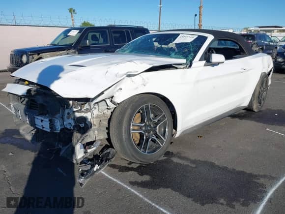 2021 Ford Mustang EcoBoost z VIN 1FATP8UH4M5102035, wystawiony jako IAAI lot #43443549 z przebiegiem 83 124 mil mil oraz . Historia ofert i sprzedaży dostępna na DreamBid. Obrazek 19.