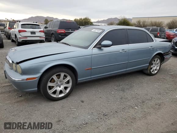 ✅ 2005 Jaguar XJ 8 LWB • VIN: SAJWA79CX5SG35319 • Лот: 49321465. Опубликован ранее на Copart с пробегом 182 834 миль. Бесплатный доступ к архиву аукционных продаж из США и подробный отчёт об истории автомобиля на DreamBid. Изображение 1.