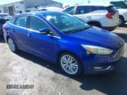 ✅ 2015 Ford Focus Titanium • VIN: 1FADP3J24FL228210 • Лот: 43499726. Опубликован ранее на IAAI с пробегом 121 672 миль. Бесплатный доступ к архиву аукционных продаж из США и подробный отчёт об истории автомобиля на DreamBid. Изображение 1.