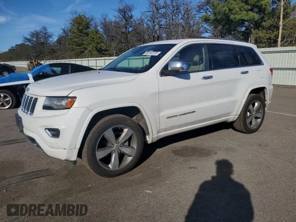 ✅ 2014 Jeep Grand Cherokee Overland • VIN: 1C4RJFCG5EC417393 • Lot: 86143725. Listed on Copart with 211,668 mi. Free auction sales archive from the USA and detailed vehicle history report at DreamBid. Image 1.