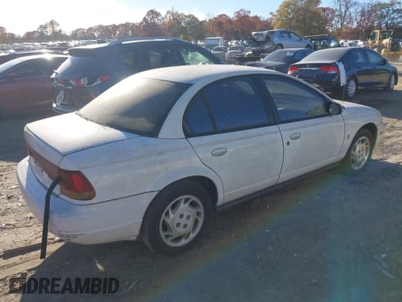 ✅ 1996 Saturn SL • VIN: 1G8ZK527XTZ254110 • Lot: 43719568. Listed on IAAI with 196,706 mi. Free auction sales archive from the USA and detailed vehicle history report at DreamBid. Image 4.