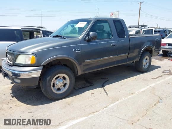 ✅ 2003 Ford F-150 XL • VIN: 1FTRX18L23NB00132 • Lot: 42495004. Listed on IAAI with 281,703 mi. Free auction sales archive from the USA and detailed vehicle history report at DreamBid. Image 2.