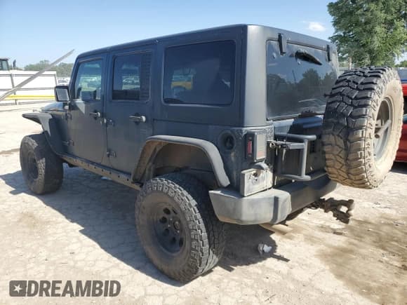 ✅ 2008 Jeep Wrangler Unlimited Rubicon • VIN: 1J8GA69198L550682 • Lot: 57333575. Listed on Copart with 176,224 mi. Free auction sales archive from the USA and detailed vehicle history report at DreamBid. Image 2.
