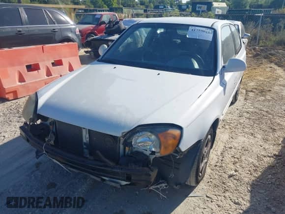 2005 Hyundai Accent GLS с VIN KMHCG35C95U344810, выставлен на аукционе IAAI как лот 41759016 с пробегом 118 202 миль миль и . История ставок и продаж доступна на DreamBid. Изображение 2.