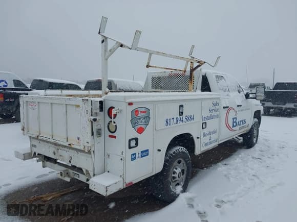 ✅ 2015 Chevrolet Silverado 2500HD Work Truck • VIN: 1GB2CUEG4FZ131745 • Lot: 41293213. Listed on IAAI with 236,044 mi. Free auction sales archive from the USA and detailed vehicle history report at DreamBid. Image 4.