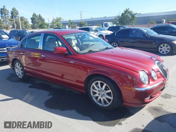 ✅ 2000 Jaguar S-Type V8 • VIN: SAJDA01D1YGL57692 • Lot: 42283196. Listed on IAAI with 73,231 mi. Free auction sales archive from the USA and detailed vehicle history report at DreamBid. Image 1.