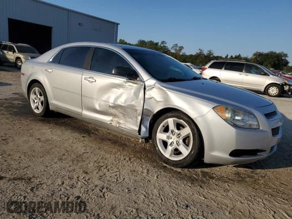 ✅ 2012 Chevrolet Malibu 1LS • VIN: 1G1ZB5E0XCF218402 • Lot: 75465434. Listed on Copart with 233,790 mi. Free auction sales archive from the USA and detailed vehicle history report at DreamBid. Image 4.