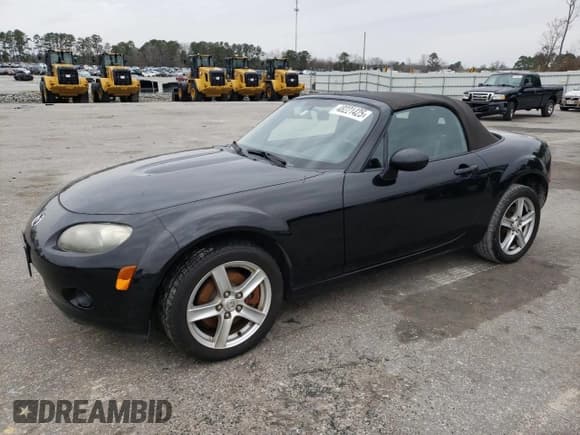 ✅ 2006 Mazda MX-5 Miata Sport • VIN: JM1NC25F360107106 • Lot: 48221425. Listed on Copart with 132,137 mi. Free auction sales archive from the USA and detailed vehicle history report at DreamBid. Image 1.