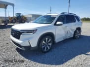 ✅ 2025 Honda Pilot Touring • VIN: 5FNYG1H78SB008325 • Лот: 89830155. Опубликован ранее на Copart с пробегом 22 315 миль. Бесплатный доступ к архиву аукционных продаж из США и подробный отчёт об истории автомобиля на DreamBid. Изображение 1.