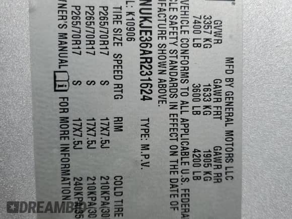 2010 Chevrolet Suburban LT z VIN 1GNUKJE36AR231624, wystawiony jako Copart lot #84595965 z przebiegiem 318 317 mil mil oraz Szkoda całkowita • Salvage title. Historia ofert i sprzedaży dostępna na DreamBid. Obrazek 13.