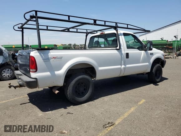 ✅ 1999 Ford F-250 XL • VIN: 1FTNF21L2XEE17853 • Lot: 58869285. Wystawiony na Copart z przebiegiem 140 220 mil. Bezpłatny archiwum sprzedaży aukcyjnych z USA i szczegółowy raport historii pojazdu na DreamBid. Zdjęcie 3.