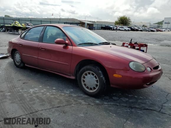 ✅ 1997 Ford Taurus LX • VIN: 1FALP53S1VG148018 • Lot: 67036654. Listed on Copart with 166,162 mi. Free auction sales archive from the USA and detailed vehicle history report at DreamBid. Image 4.