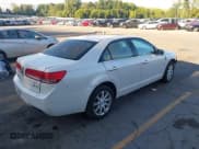 ✅ 2010 Lincoln MKZ • VIN: 3LNHL2GC2AR606614 • Lot: 43064435. Listed on IAAI with 143,166 mi. Free auction sales archive from the USA and detailed vehicle history report at DreamBid. Image 4.