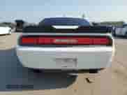 2013 Dodge Challenger SXT z VIN 2C3CDYAG1DH649372, wystawiony jako Copart lot #65924934 z przebiegiem 169 588 mil mil oraz Szkoda całkowita • Salvage title. Historia ofert i sprzedaży dostępna na DreamBid. Obrazek 6.