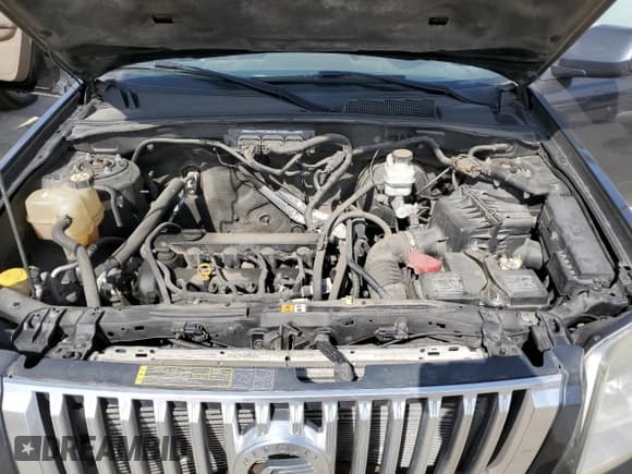 ✅ 2010 Mercury Mariner Premier • VIN: 4M2CN8H73AKJ26917 • Lot: 49075745. Listed on Copart with 223,692 mi. Free auction sales archive from the USA and detailed vehicle history report at DreamBid. Image 12.