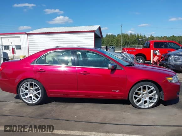 ✅ 2009 Lincoln MKZ • VIN: 3LNHM26T09R629187 • Lot: 43375377. Listed on IAAI with 133,765 mi. Free auction sales archive from the USA and detailed vehicle history report at DreamBid. Image 13.