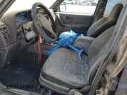 ✅ 1999 Jeep Cherokee Sport • VIN: 1J4FT68S0XL555883 • Lot: 51016255. Listed on Copart with 128,306 mi. Free auction sales archive from the USA and detailed vehicle history report at DreamBid. Image 7.