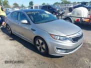 ✅ 2011 Kia Optima EX Hybrid • VIN: KNAGM4AD3B5000878 • Lot: 43129512. Listed on IAAI with 193,129 mi. Free auction sales archive from the USA and detailed vehicle history report at DreamBid. Image 1.