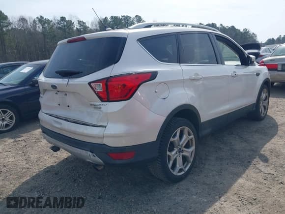 ✅ 2019 Ford Escape Titanium • VIN: 1FMCU0J99KUB62389 • Lot: 41792898. Listed on IAAI with 91,534 mi. Free auction sales archive from the USA and detailed vehicle history report at DreamBid. Image 4.