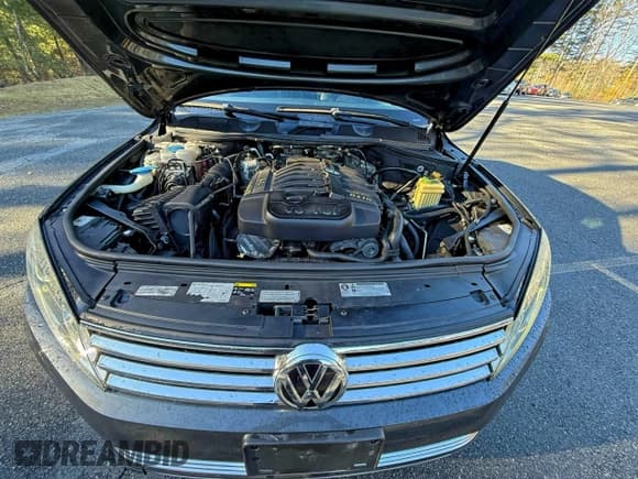 ✅ 2016 Volkswagen Touareg Lux • VIN: WVGEF9BP3GD005114 • Лот: 95557415. Опубликован ранее на Copart с пробегом 165 392 миль. Бесплатный доступ к архиву аукционных продаж из США и подробный отчёт об истории автомобиля на DreamBid. Изображение 9.